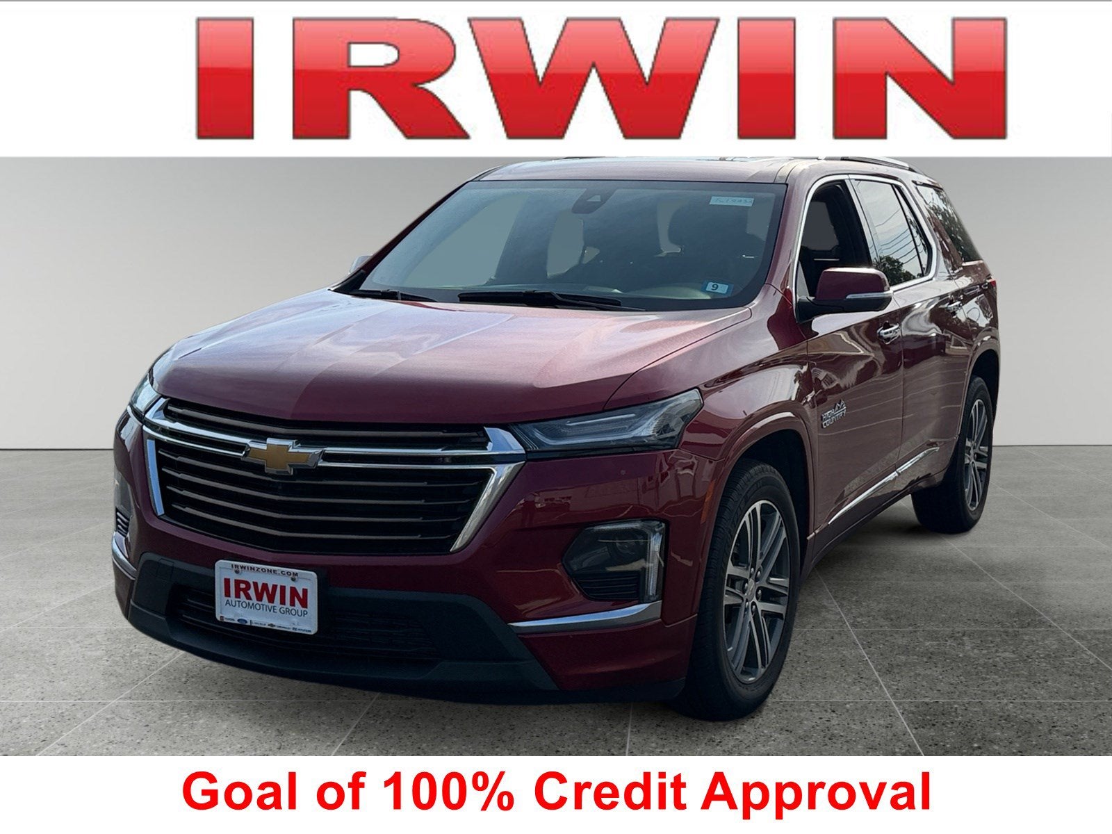 2023 Chevrolet Traverse High Country in Radiant Red Tintcoat — front three-quarter view