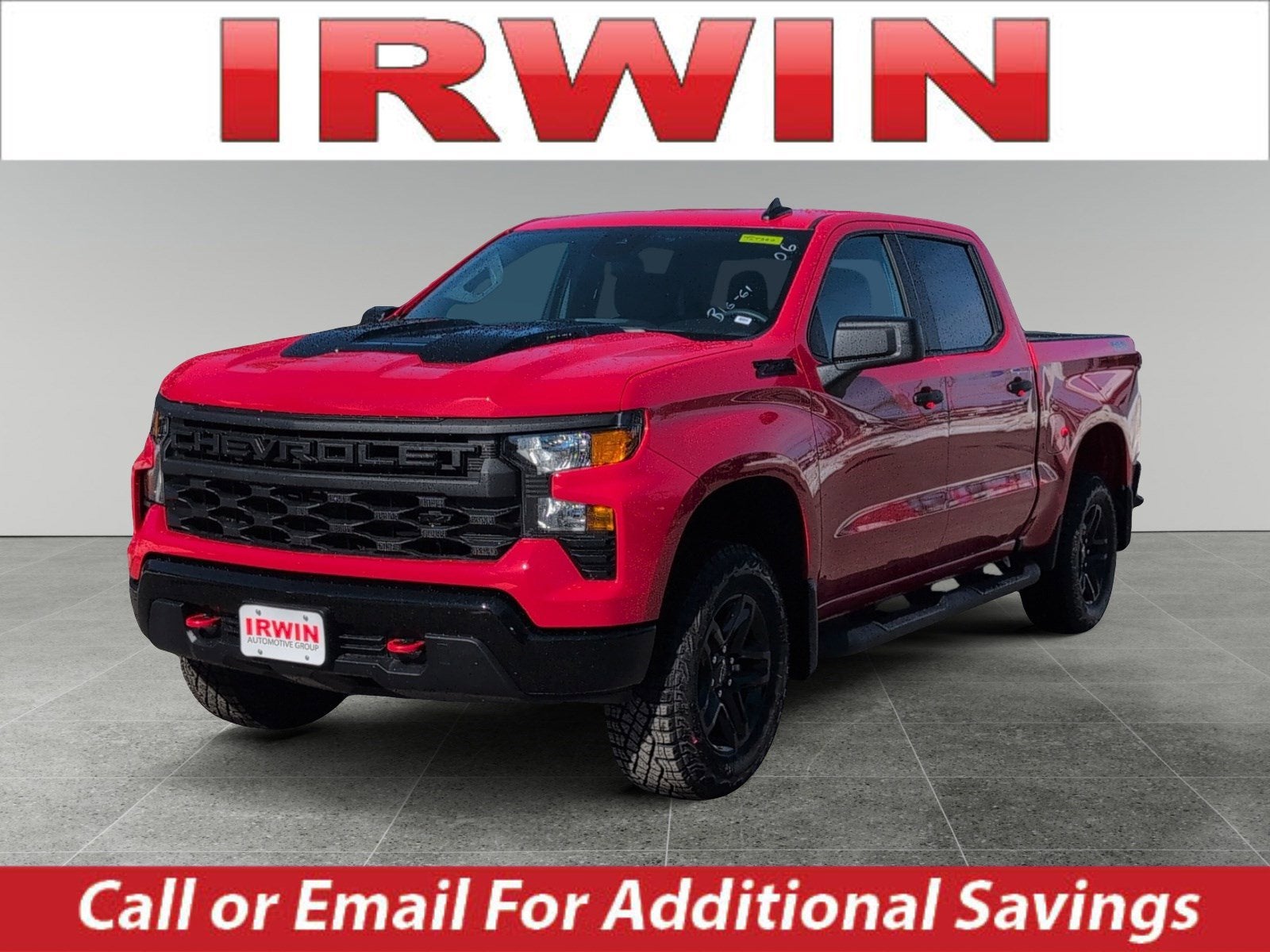 2026 Chevrolet Silverado 1500 Custom Trail Boss in Red Hot — front three-quarter view