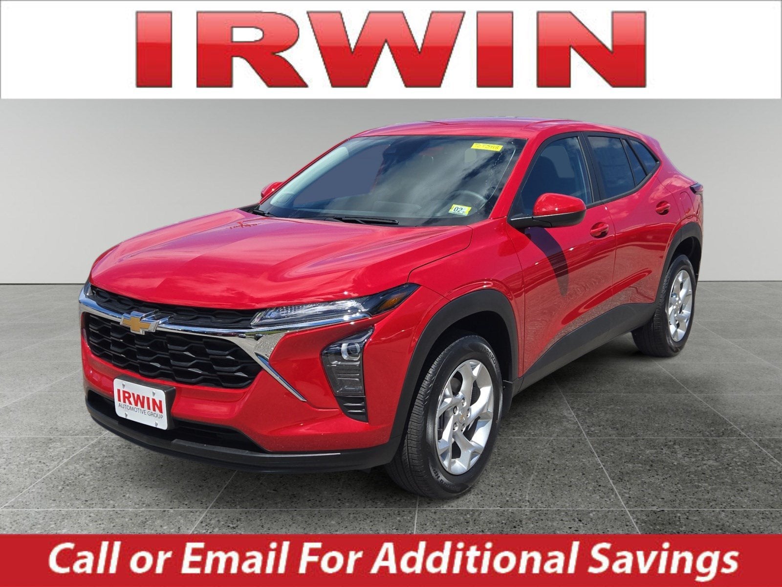 2026 Chevrolet Trax LS in Apex Red — front three-quarter view