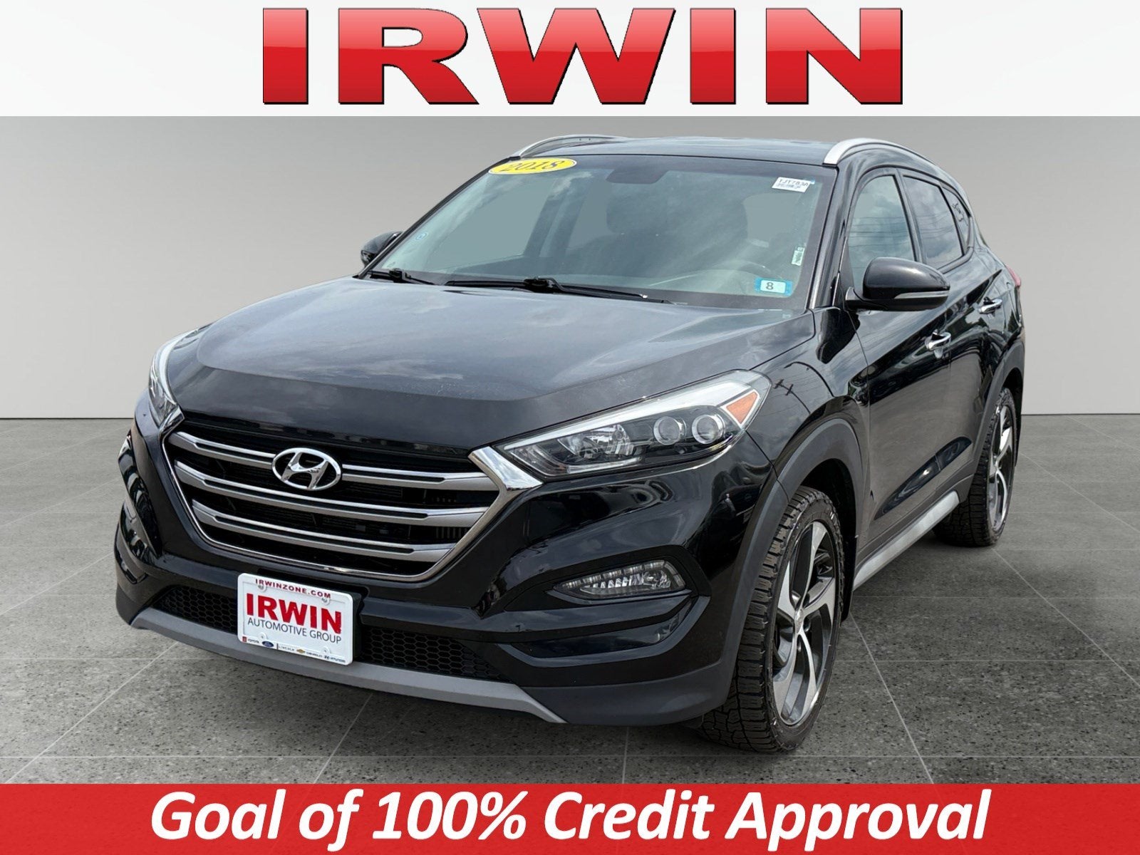 2018 Hyundai Tucson Limited in Black Noir Pearl — front three-quarter view